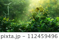 Green recycling symbol with sunrise over a field with wind turbines. Green energy solutions and sustainable power engineering and eco-friendly technology. Generative AI 112459496