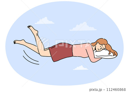 Happy woman levitate in air sleeping on pillow 112460868