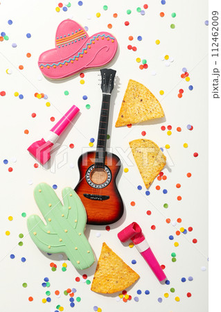 Cinco de Mayo celebration concept, nachos with decorations Cinco de Mayo celebration concept, nachos with decorations 112462009