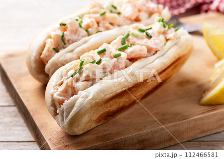 Lobster roll on wooden table Lobster roll on wooden table 112466581