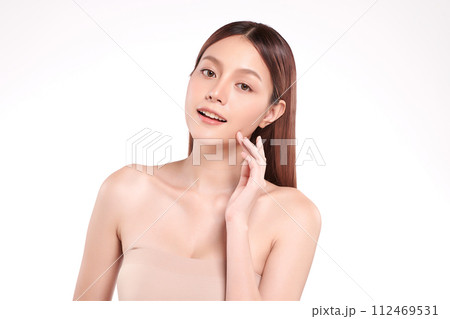 Beautiful young asian woman with clean fresh skin on white background, Face care, Facial treatment, Cosmetology, beauty and spa, Asian women portrait. Beautiful young asian woman with clean fresh skin on white background, Face care, Facial treatment, Cosmetology, beauty and spa, Asian women portrait. 112469531