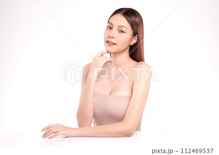 Beautiful young asian woman with clean fresh skin on white background, Face care, Facial treatment, Cosmetology, beauty and spa, Asian women portrait. Beautiful young asian woman with clean fresh skin on white background, Face care, Facial treatment, Cosmetology, beauty and spa, Asian women portrait. 112469537