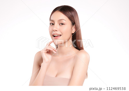 Beautiful young asian woman with clean fresh skin on white background, Face care, Facial treatment, Cosmetology, beauty and spa, Asian women portrait. Beautiful young asian woman with clean fresh skin on white background, Face care, Facial treatment, Cosmetology, beauty and spa, Asian women portrait. 112469538
