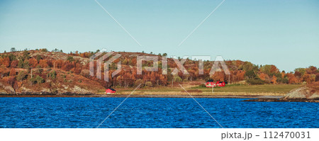 Norwegian panoramic landscape, coastal view with colorful wooden houses Norwegian panoramic landscape, coastal view with colorful wooden houses 112470031