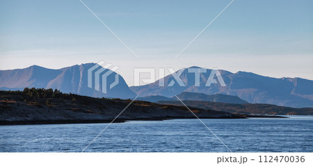 Coastal mountains panorama. Norwegian landscape photo Coastal mountains panorama. Norwegian landscape photo 112470036