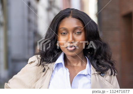 Confident Young African Woman in Urban Setting 112471077