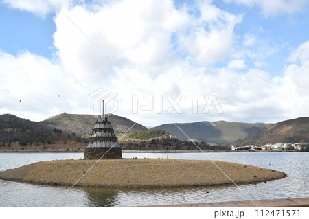 pagoda on island at lake of Ganden Sumtseling Monastery lama monk temple from Tibet culture in China 112471571