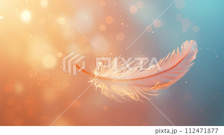 A single feather floats in a dance with light, surrounded by a warm bokeh effect that captures a moment of weightless beauty and freedom 112471877