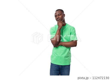 young smart american male advertiser dressed in green t-shirt with mockup thoughtful 112472130