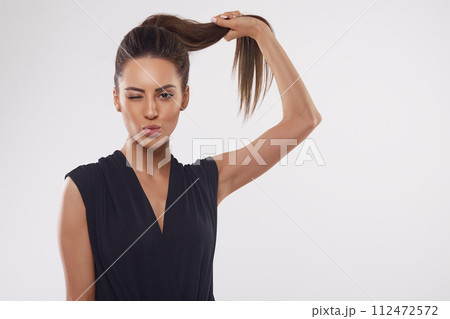 Portrait of woman with beautiful long hair. Beauty model girl with brown straight long hair. Care and hair products Portrait of woman with beautiful long hair. Beauty model girl with brown straight long hair. Care and hair products 112472572