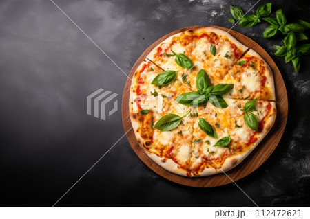 Italian pizza Margherita with cheese, tomato sauce and basil on table top view with copy space for yor text. 112472621