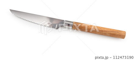 A used jagged meat cutting knife 112473190