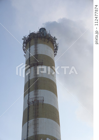 The main provides the city with hot water. Selective focus. The pipes of the central heating system 112477874
