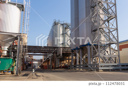 Brewery silos or tanks typically use for storing barley or fermented beer. Brewery silos or tanks typically use for storing barley or fermented beer. 112478031