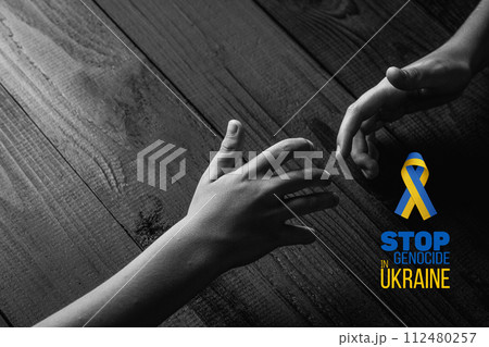 childrens hands reaching out to each other childrens hands reaching out to each other 112480257