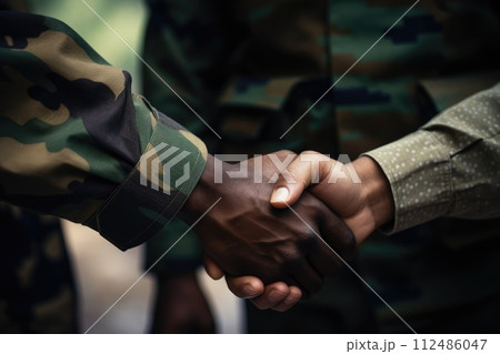 soldiers shaking hands. war peace and end. ceasefire and reconciliation. generative ai 112486047