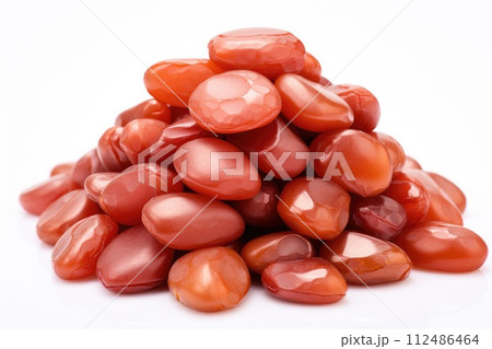 Argan seeds isolated on a white banner background. Generative A Argan seeds isolated on a white banner background. Generative A 112486464