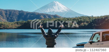 Woman tourist enjoy with Fuji Mountain at Lake Saiko, happy Traveler sightseeing Mount Fuji and road trip Fuji Five Lakes. Landmark for tourists attraction. Japan Travel, Destination and Vacation Woman tourist enjoy with Fuji Mountain at Lake Saiko, happy Traveler sightseeing Mount Fuji and road trip Fuji Five Lakes. Landmark for tourists attraction. Japan Travel, Destination and Vacation 112487360
