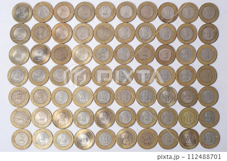 Various Indian ten rupee coins obverse coin texture background Various Indian ten rupee coins obverse coin texture background 112488701