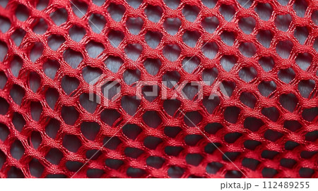 A close up view of a red net 112489255