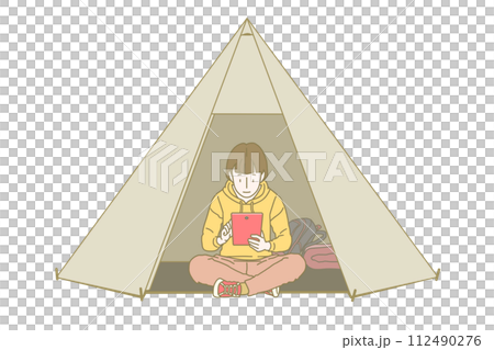 A woman in long sleeves and long pants is sitting cross-legged at the entrance of a tent and relaxing looking at a red tablet screen. A woman in long sleeves and long pants is sitting cross-legged at the entrance of a tent and relaxing looking at a red tablet screen. 112490276