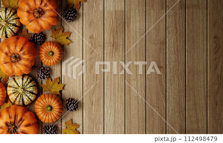 Top view Halloween decoration concept made from autumn leaves and pumpkin on wooden background. Flat lay, top view with copy space. 3d render. 112498479
