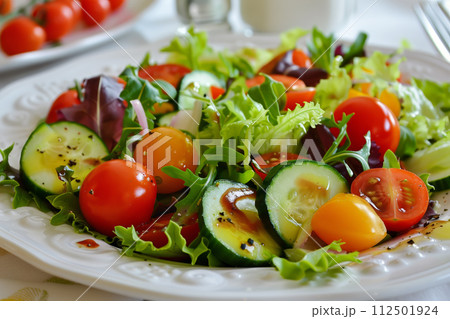 AI-generated content. Healthy mixed salad on white plate and table 112501924