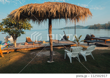 Palm-tree beaches and relaxation areas on the island Palm-tree beaches and relaxation areas on the island 112502917