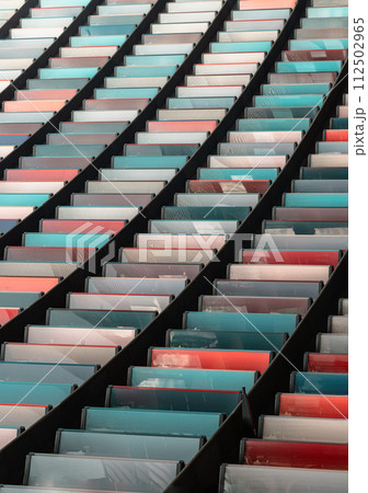 Bright panels of colorful on Modern architecture of Mizuho bank office building. 112502965