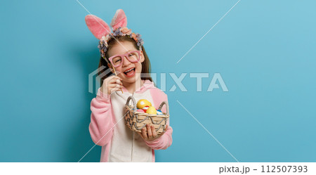 Girl with painted eggs. Girl with painted eggs. 112507393