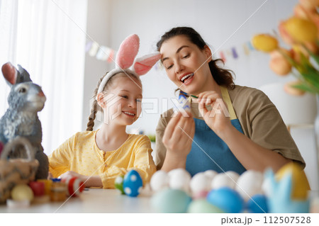 family preparing for Easter family preparing for Easter 112507528