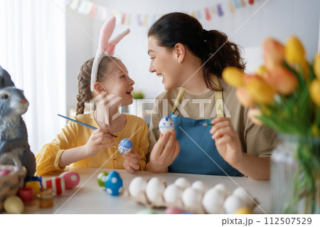 family preparing for Easter family preparing for Easter 112507529