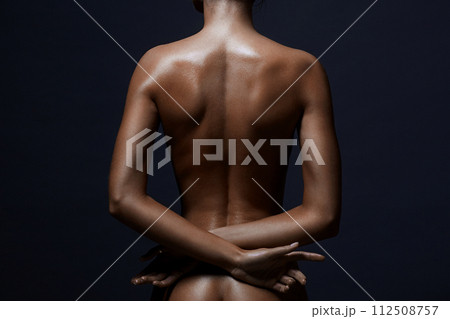 Naked woman in dark. Beautiful Female Back 112508757