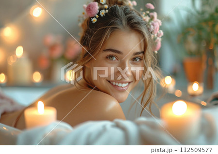 Beautiful young woman enjoying spa, seating in a jacuzzi Beautiful young woman enjoying spa, seating in a jacuzzi 112509577
