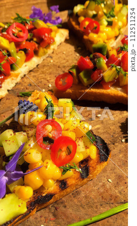 Pizza cut into triangles. Selective focus. AI-generated item Pizza cut into triangles. Selective focus. AI-generated item 112511254