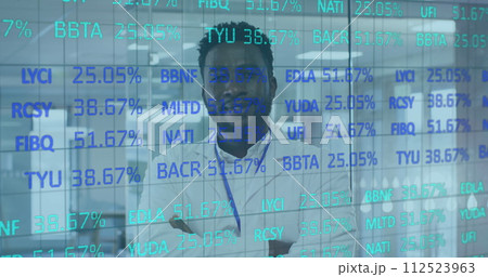 Image of digital interface showing statistics with doctor looking at camera and smiling Image of digital interface showing statistics with doctor looking at camera and smiling 112523963