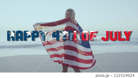 Image of happy 4th of july text with american flag pattern, woman wrapped in usa flag on beach Image of happy 4th of july text with american flag pattern, woman wrapped in usa flag on beach 112524024