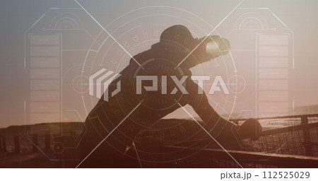 Round scanner against african american fit man drinking water on the promenade Round scanner against african american fit man drinking water on the promenade 112525029