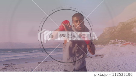 Speech bubble with increasing likes against african american male boxer practicing boxing at beach Speech bubble with increasing likes against african american male boxer practicing boxing at beach 112525196