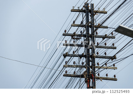 Old style Telegraph poles along Many types Telecommunication cable the railway communication system pillar Thailand 112525493