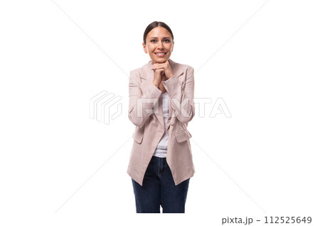 pleasant young woman with black hair in a jacket stands thoughtfully on a white background with copy pleasant young woman with black hair in a jacket stands thoughtfully on a white background with copy 112525649