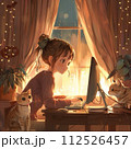 猫に囲まれて在宅ワークをする女性 112526457