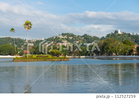 The small artificial island situated in the centre of Kandy lake, Sri Lanka. This island was used by the king's harem for bathing and was connected to the palace by secret tunnel. The small artificial island situated in the centre of Kandy lake, Sri Lanka. This island was used by the king's harem for bathing and was connected to the palace by secret tunnel. 112527259
