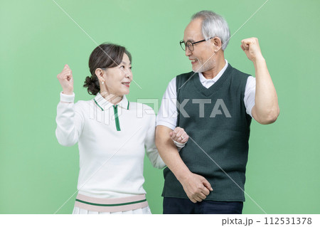 A senior wear a golf suit A senior wear a golf suit 112531378