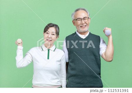 A senior wear a golf suit A senior wear a golf suit 112531391