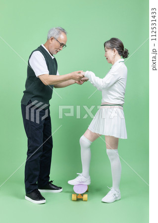 A senior wear a golf suit A senior wear a golf suit 112531433