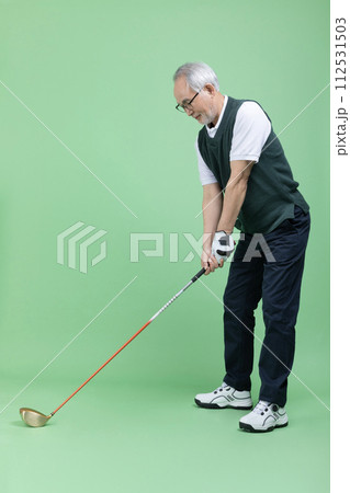 A male senior who plays golf A male senior who plays golf 112531503
