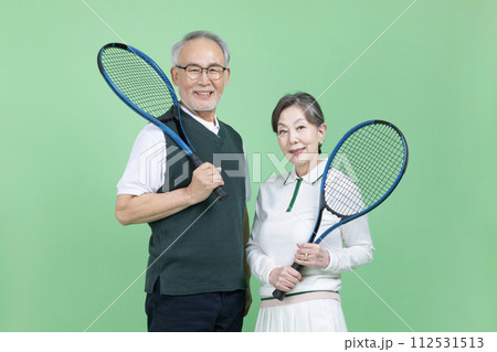 A senior with a tennis racket A senior with a tennis racket 112531513