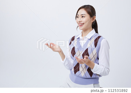 A woman who explains in a chair with her employee ID around her neck A woman who explains in a chair with her employee ID around her neck 112531892