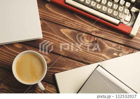 Vintage typewriter on wooden table close up Vintage typewriter on wooden table close up 112532017